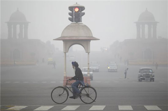 Dense fog, cold wave engulf north India