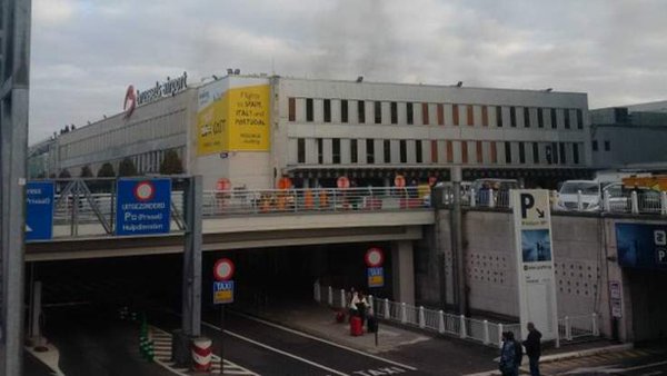 Two loud explosions at Brussels airport, 14 reported dead, scores of others injured