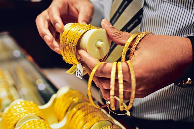 Gold Tumbles By Rs 300 On Weak Global Cues, Fall In Demand