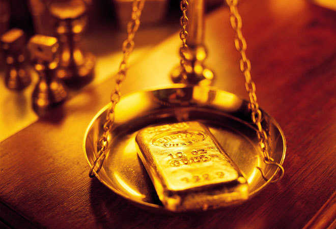 Gold futures fall Rs 25 as weak global cues hurt