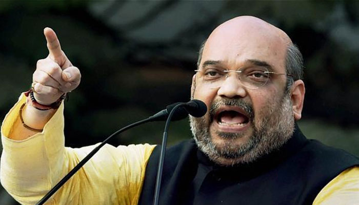 Unfurl the victory flag in Delhi too, Shah to BJP workers