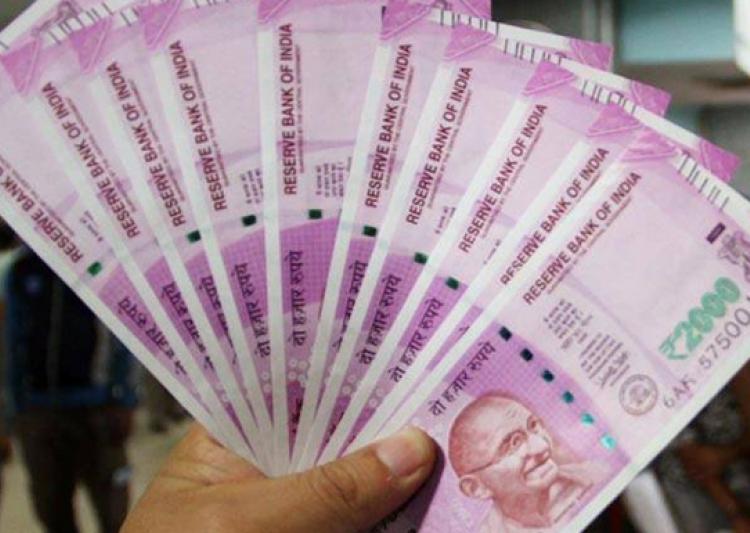 Rupee falls by 27 paise against dollar in opening trade
