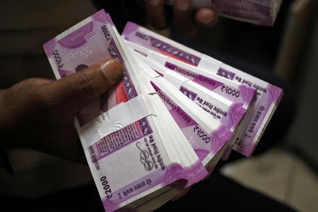 Rupee opens 20 paise lower at 64.51 against dollar