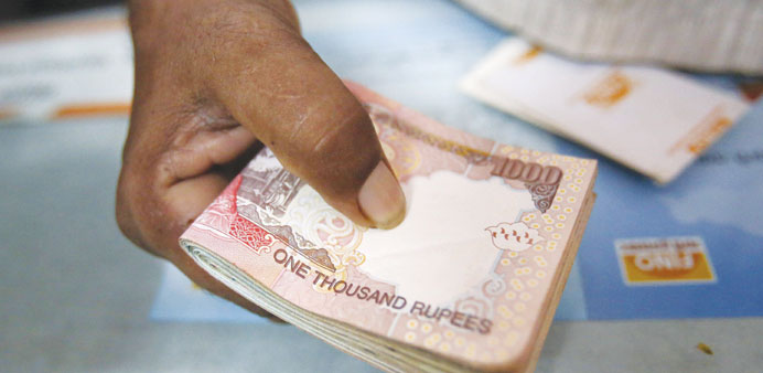Rupee gains 4 paise against dollar in early trade