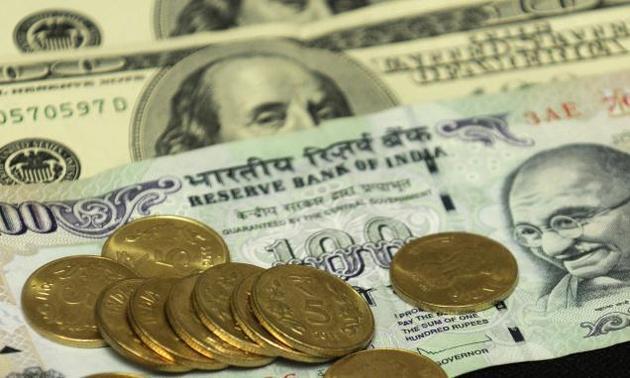 Rupee softens 5 paise against dollar