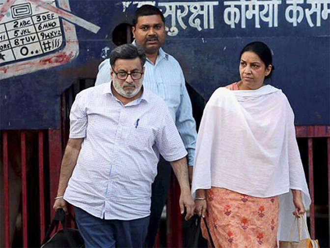 Talwars walk out of jail quietly; back home in Noida