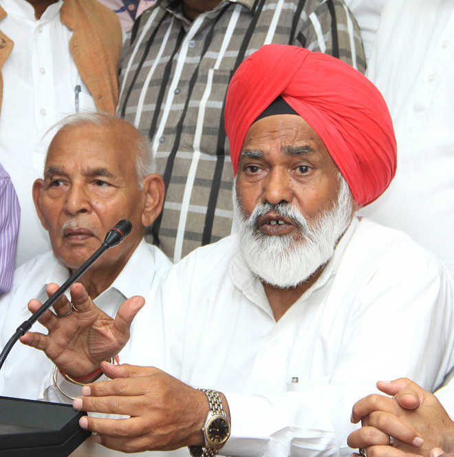 Shamsher Singh Dullo stands in support of Anganwadi Workers