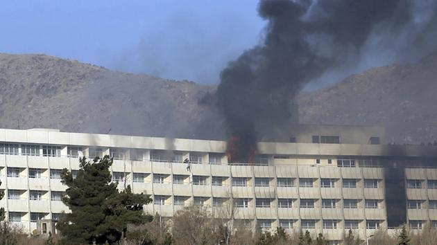 Taliban attack on Afghan hotel ends after 13 hours, 18 dead