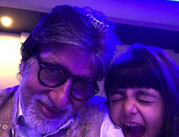 Aaradhya plants her tiara on Amitabh Bachchan, its the cutest thing on the internet!