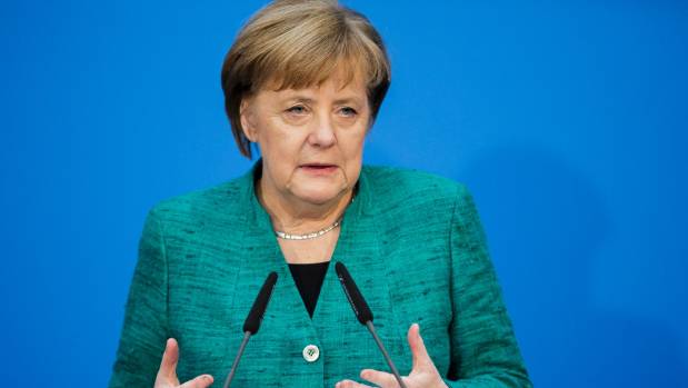 Merkel clinches German coalition govt but hurdle remains