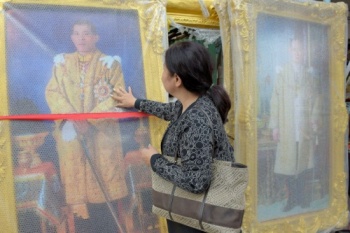 Thai teens handed years-long sentences for burning royal portraits