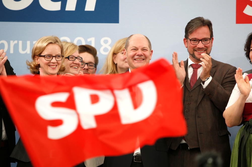 Germany's crisis-hit SPD starts ballot on Merkel coalition
