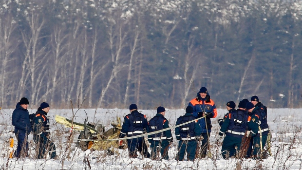 Workers find both data recorders at Russian plane crash site