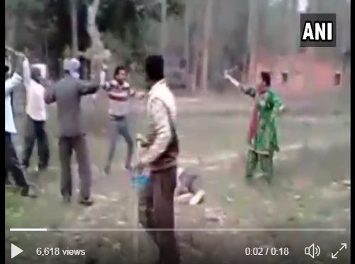 Watch: Woman saves husband's life as he was thrashed by goons