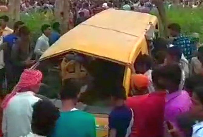 13 school children killed as train hits school van in UP