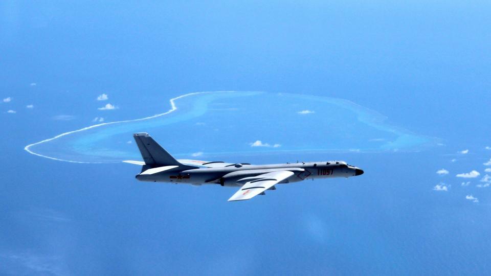 China lands bomber on South China Sea island for first time, US sees red
