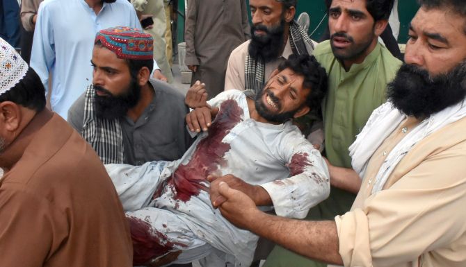 90 killed, over 180 injured in twin election-related blasts in Pak