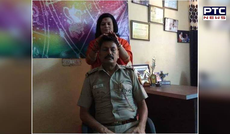 Sadhvi massaging SHO's head, picture goes viral