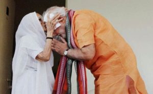 prime-minister-narendra-modi-takes-his-mother-blessings-in-gujarat