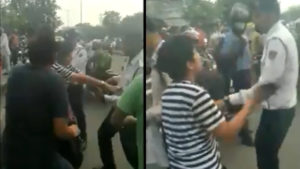 Delhi Mayapuri Drunk woman stopped for not wearing helmet 