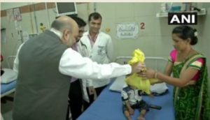 Amit Shah sweeps the floor in AIIMS as part of the party's 'Seva Saptah'campaign
