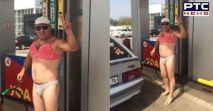 Woman And Men colorful bikini wearing pumps take Petrol free In Russia