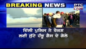 Farmers Protest : Punjab farmers at Delhi border , Police use tear gas shells at Delhi