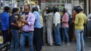 People rush as liquor stores reopen in Noida after Covid-19 lockdown