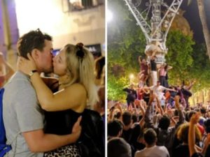 lockdown ends in Spain , youngsters come out on streets to celebrate ,couple kiss photo viral