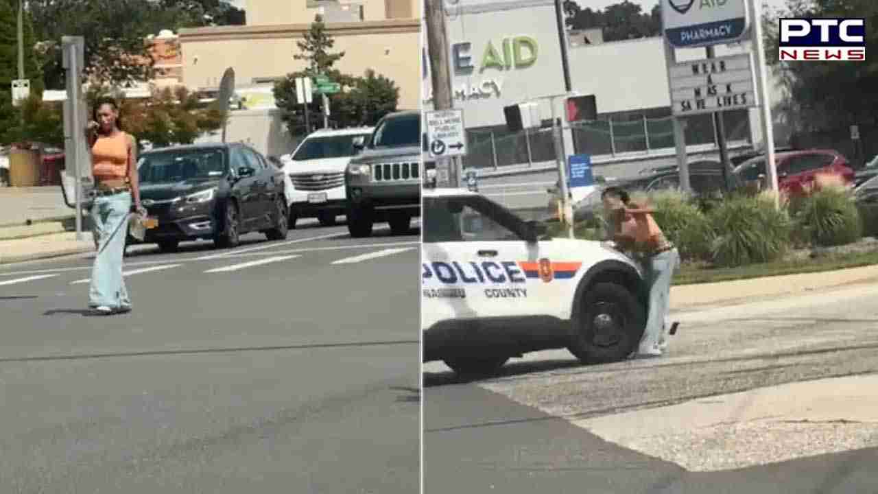 US: Cop drives cruiser into woman pointing gun at traffic, video goes viral