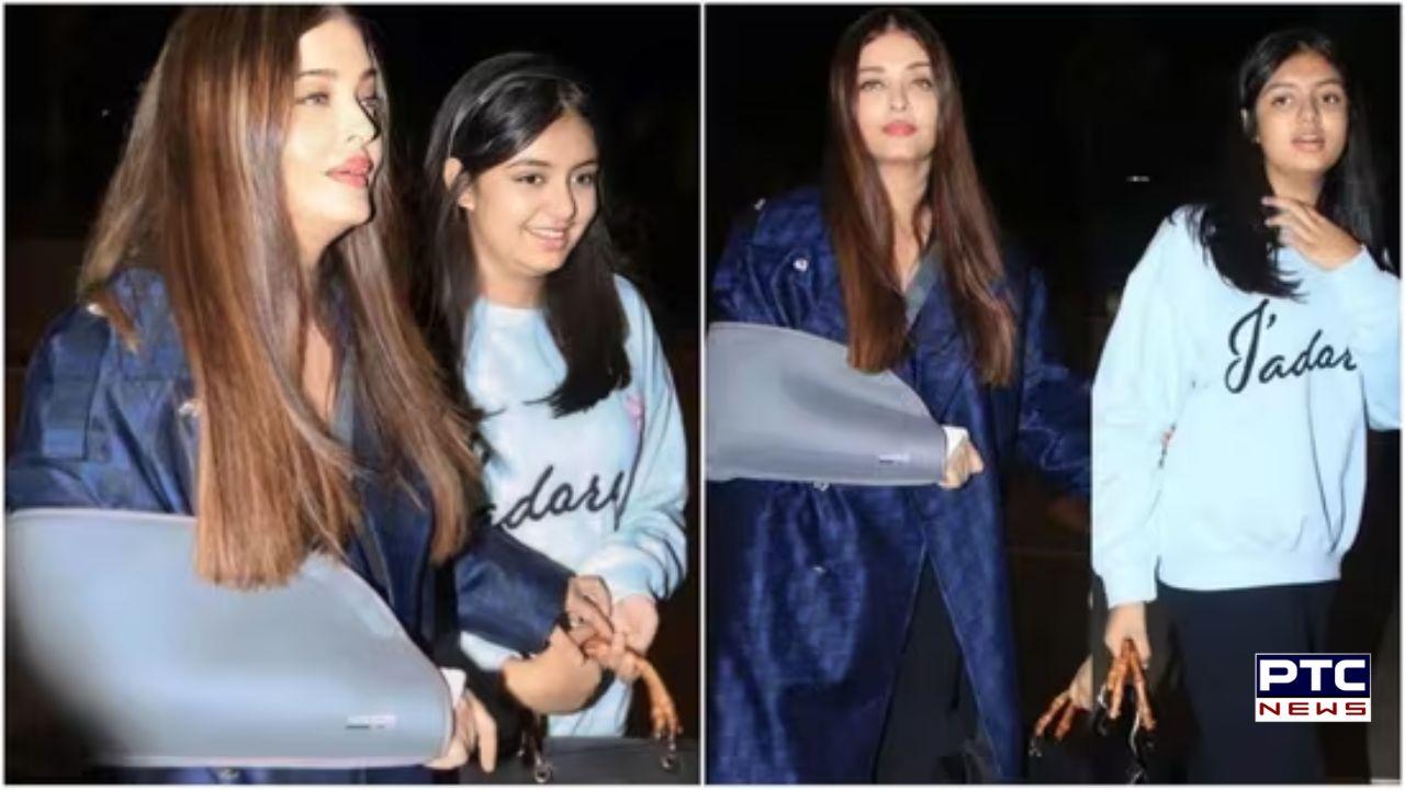 Aishwarya Rai Bachchan sets off to Cannes with daughter Aaradhya, sporting elegant navy blue trench coat valued at Rs 64k | Check it Out!