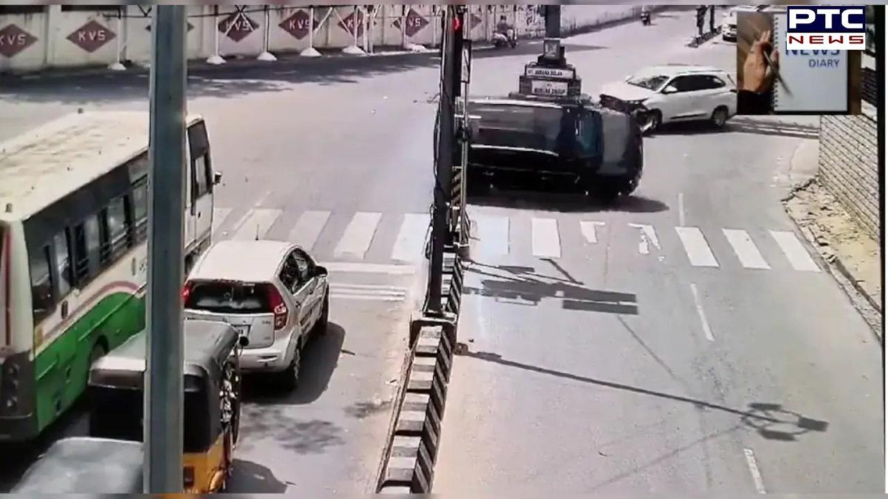 Caught on camera: Speeding car runs red light, collides with another, and flips multiple times