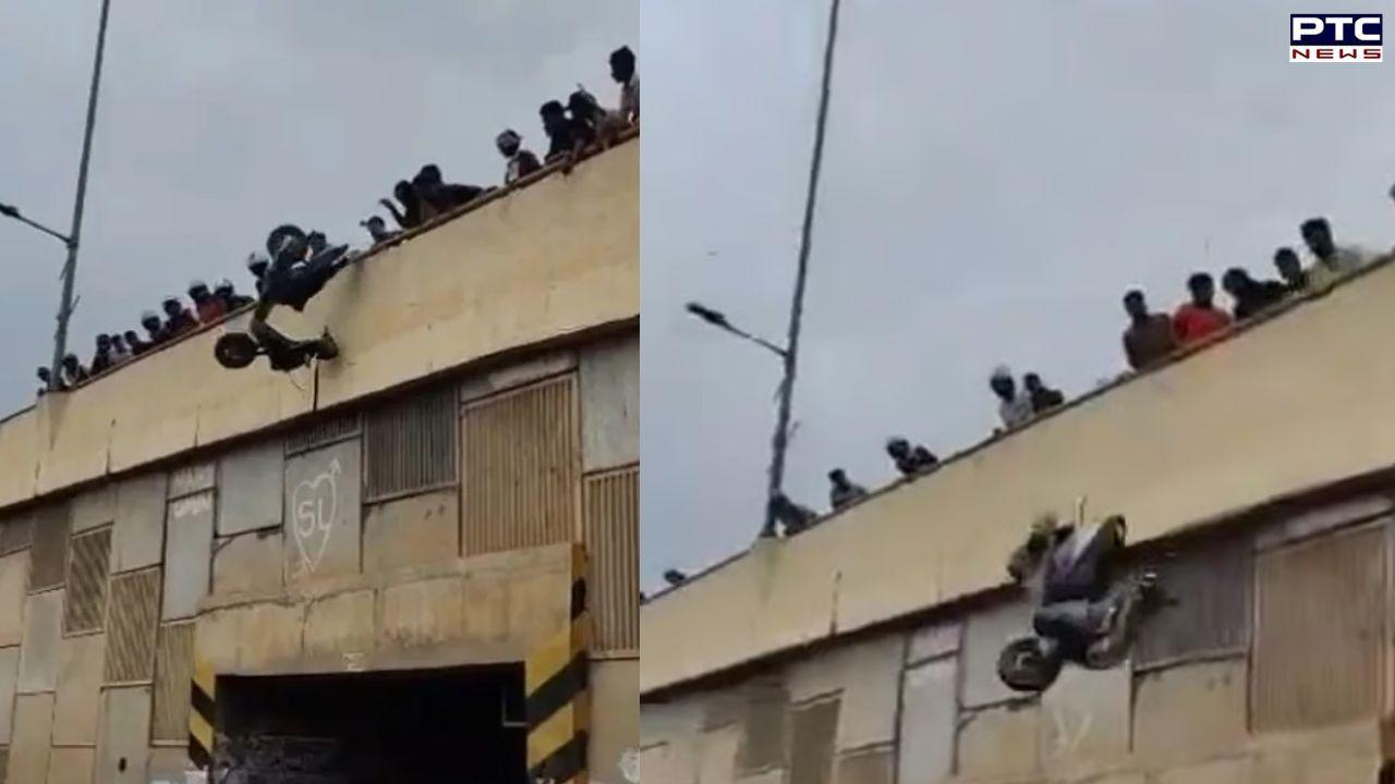 WATCH | Angry locals throw 2 scooters off flyover as stunt riders disrupt traffic on busy flyover