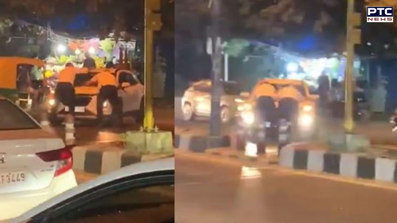 WATCH | Delhi man drags 2 traffic cops on bonnet in Delhi