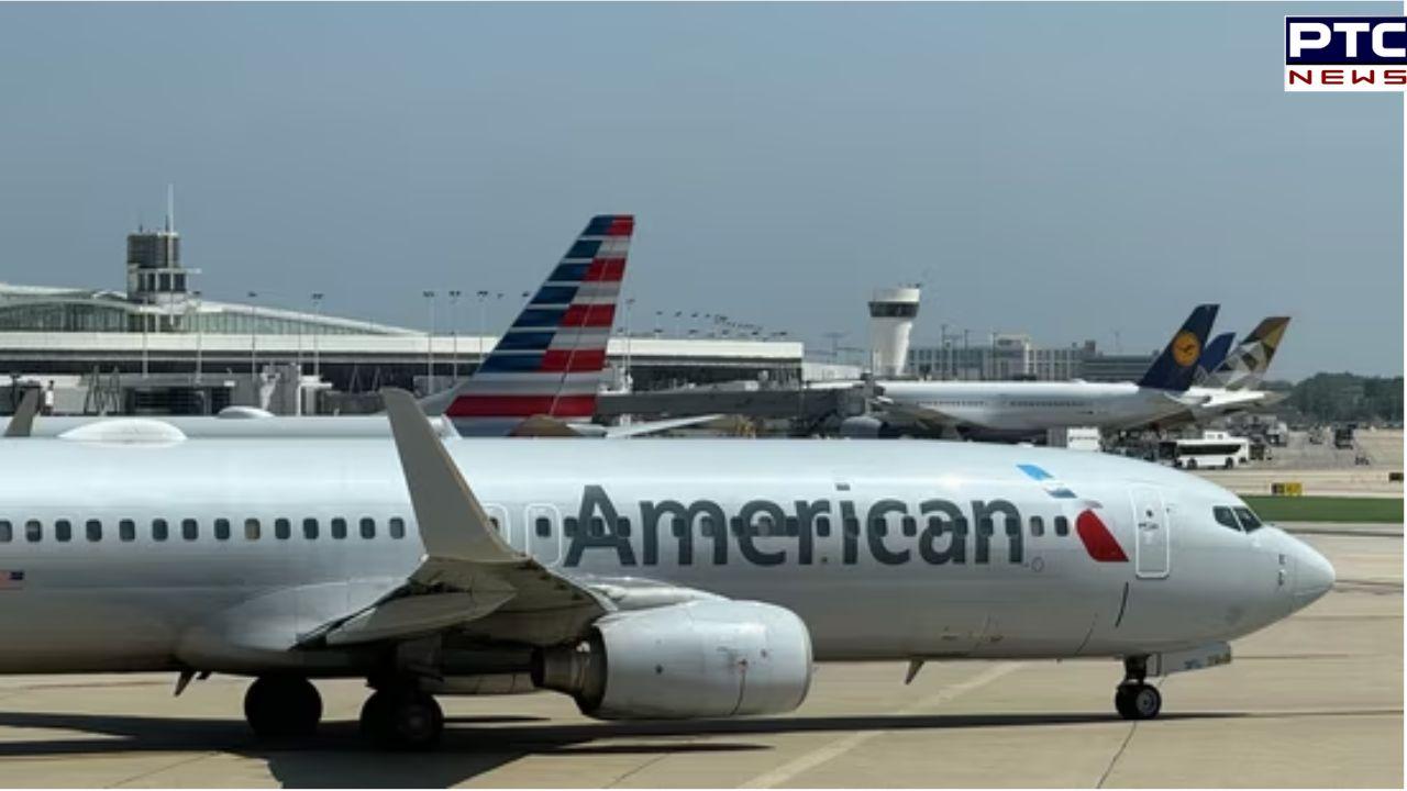 American Airlines grounds all flights on Christmas Eve; resumes operations after an hour